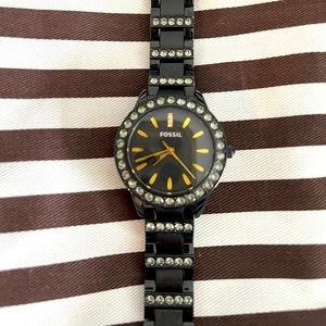 FOSSIL black with rhinestones.
